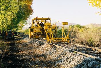 tamping new track.